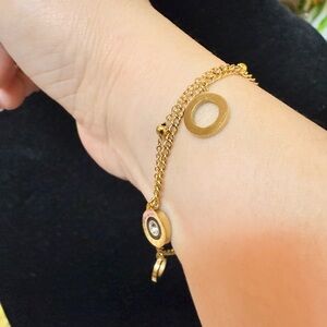 Elegant Gold Bracelet with Circular Charms
Non tarnish , Hypo allergenic